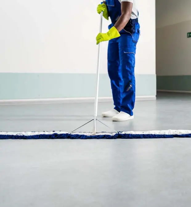 Cleaner preparing a space after construction