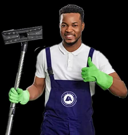 Cleaner mopping a bright commercial floor